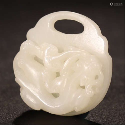 A CHINESE CARVED HETIAN WHITE JADE DRAGON PENDANT