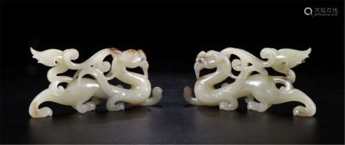 A PIAR OF CHINESE CARVED JADE DRAGON TABLE ITEMS