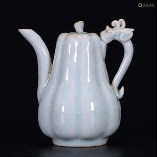 A CHINESE PORCELAIN HANDLE KETTLE