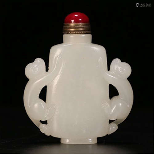 A CHINESE CARVED JADE HANDLE SNUFF BOTTLE