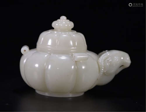 A CHINESE CARVED JADE TEA POT