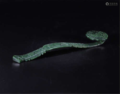 A CHINESE CARVED SPINACH JADE RUYI SCEPTER