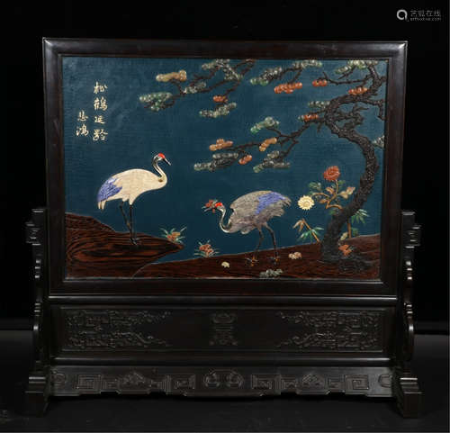 A CHINESE CARVED WOOD CRANE AND PINE TABLE SCREEN