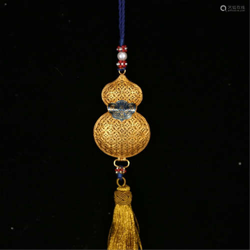 A CHINESE GILT SILVER GOURD INCENSE CAGE