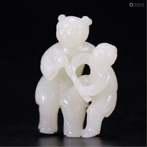 A FINE CHINESE CARVED WHITE JADE BOY TABLE ITEM