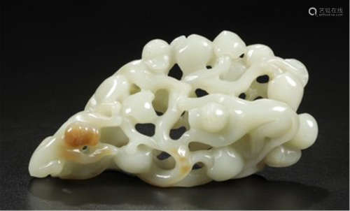A CHINESE WHITE JADE MONKEY AND PEACH TABLE ITEM