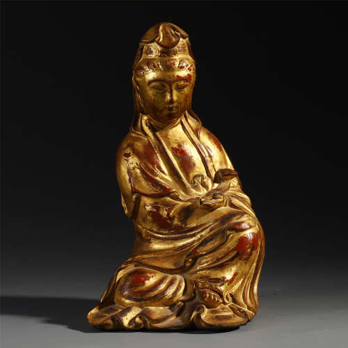 A CHINESE CARVED WOOD LACQUER GOLD SEATED BUDDHA