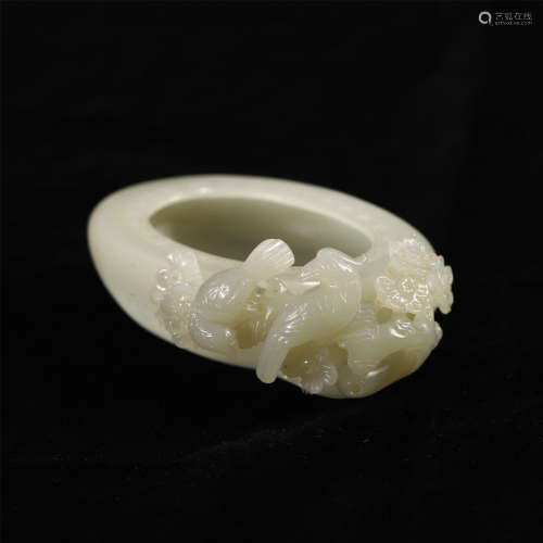 A CHINESE CARVED JADE FLOWER AND BIRD BRUSH WASHER