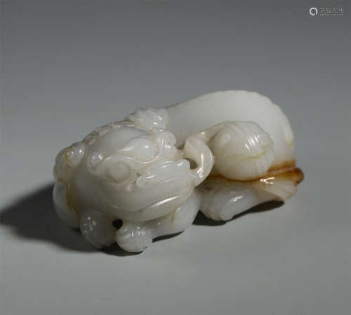 A CHINESE CARVED JADE DRAGON TABLE ITEM