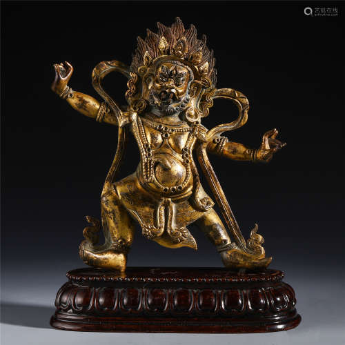 A CHINESE GILT BRONZE SEATED MAHAKALA