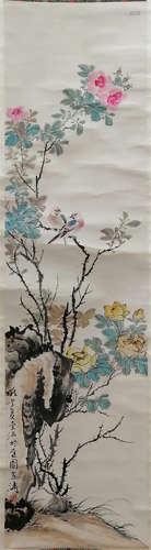 A CHINESE SCROLL PAINTING OF FLOWER AND BIRD