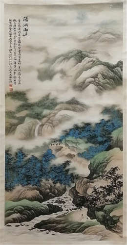 A CHINESE SCROLL PAINTING OF MOUNTAIN VIEW WITH CALLIGRAPHY