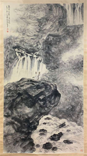 A CHINESE SCROLL PAINTING OF MEN IN MOUNTAIN