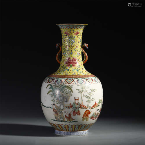 A CHINESE PORCELAIN COLOUR PAINTED BOY AND FLOWER HANDLE VASE
