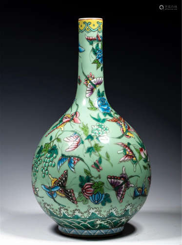 A CHINESE PORCELAIN COLOUR PAINTED FLOWER AND BUTTERFLY VASE