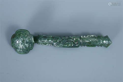 A CHINESE CARVED CELADON JADE RUYI SCEPTER
