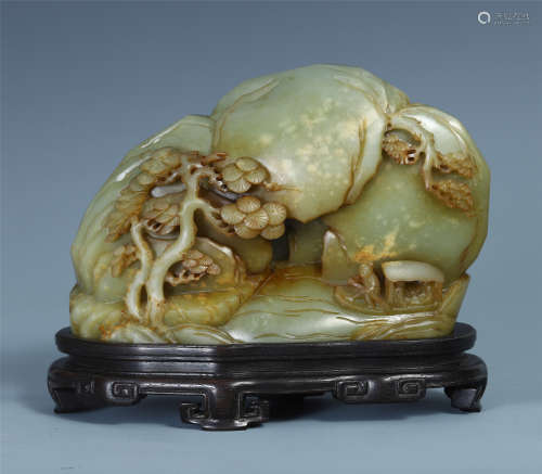 A CHINESE CARVED JADE FISHERMAN ON BOAT TABLE ITEM