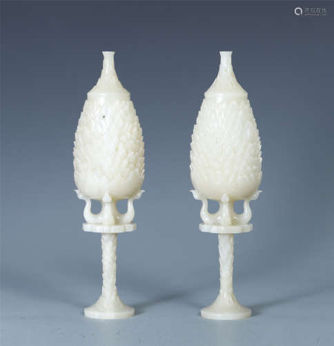 A PAIR OF CHINESE CARVED WHITE JADE TABLE ITEMS