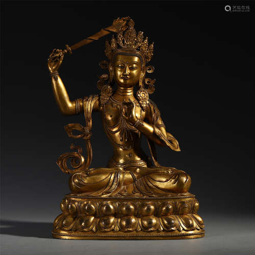 A CHINESE GILT BRONZE SEATED BUDDHA