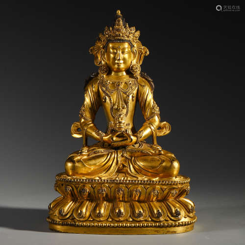 A CHINESE GILT BRONZE SEATED BUDDHA