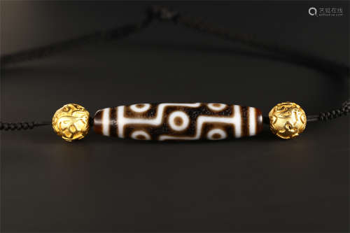 TIBETAN NINE CIRCLE DZI BEAD