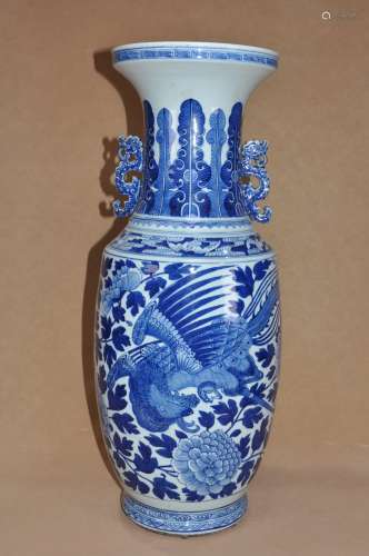 A QING  DYNASTY  BLUE  AND  WHITE  BOTTLE WITH  PHOENIX FLYING THROUGH PEONY