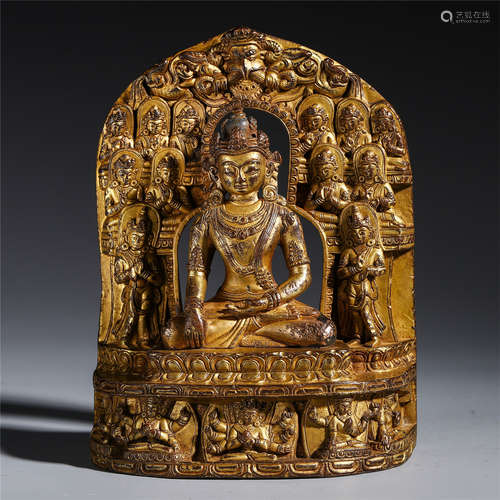 A CHINESE GILT BRONZE SEATED GUANYIN