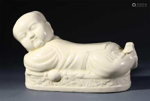 A CHINESE PORCELAIN BOY TABLE ITEM