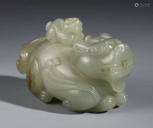 A CHINESE CARVED JADE BEAST INCENSE CAGE