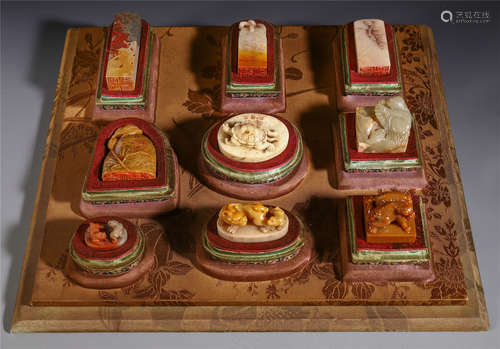 A SET OF CHINESE CARVED JADE AND STONE SEAES