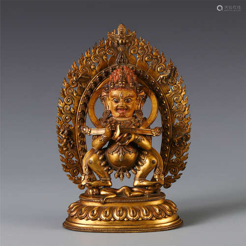 A CHINESE GILT BRONZE STANDING BUDDHA