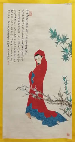 A CHINESE SCROLL PAINTING OF WOMAN WITH CALLIGRAPHY