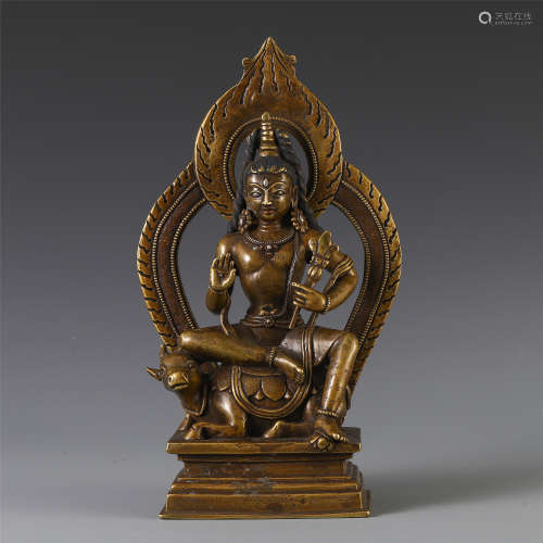 A CHINESE SILVER INLAID BRONZE SEATED GUANYIN