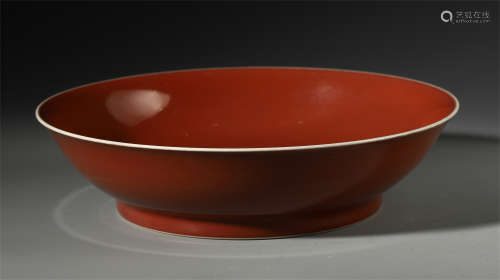 A CHINESE PORCELAIN RED GLAZED DISH