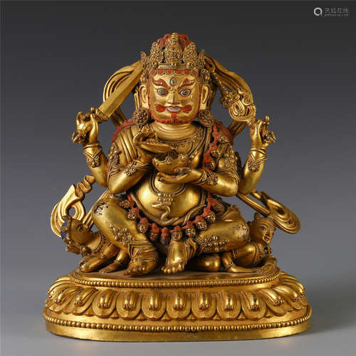 A CHINESE GILT BRONZE SEATED BUDDHA