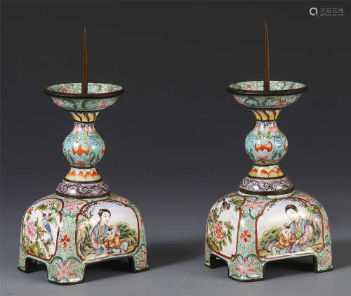A PAIR OF CHINESE CLOISONNE FIGURE CANDLE HOLDERS