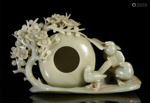 A CHINESE CARVED JADE FLOWER AND BIRD TABLE ITEM