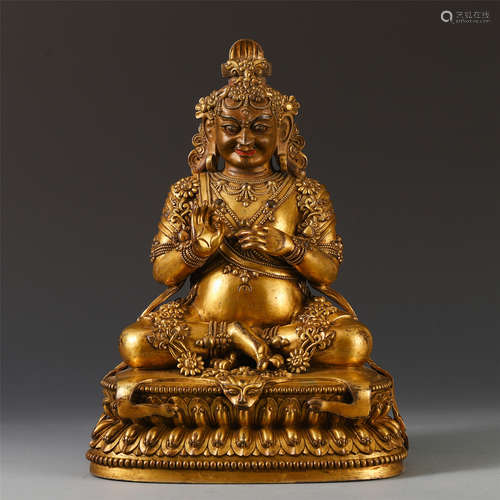 A CHINESE GILT BRONZE SEATED BUDDHA