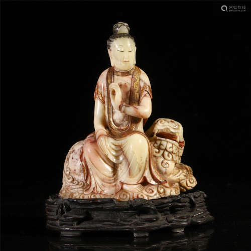 A CHINESE CARVED SOAP STONE GOLD INLAID SEATED GUANYIN