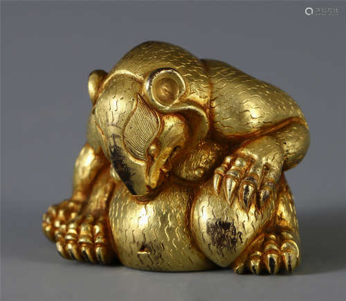 A CHINESE GILT BRONZE ANIMAL TABLE ITEM