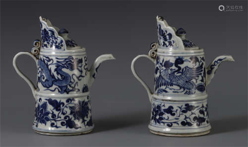 A PAIR OF CHINESE PORCELAIN BLUE AND WHITE DRAGON PHOENIX TEA POTS