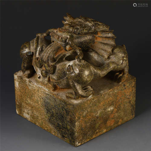 A CHINESE CARVED STONE DRAGON SEAL