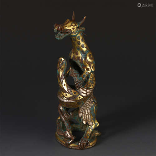 A CHINESE GOLD AND SILVER INLAID BRONZE BEAST TABLE ITEM