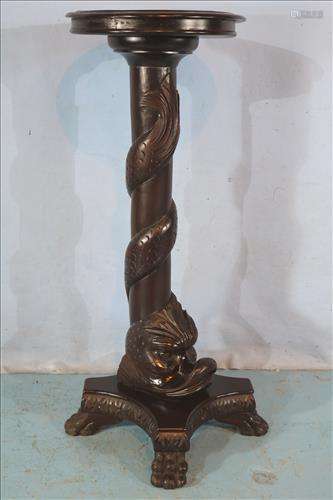 Mahogany pedestal with carved dolphin