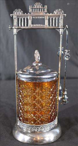 Antique silver-plate pickle caster with amber insert