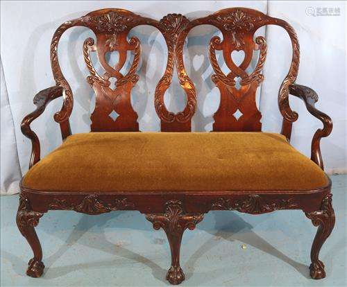 Contemporary mahogany Chippendale love seat