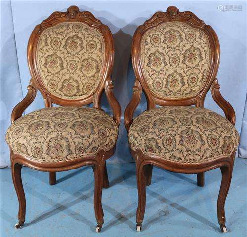 Pair of walnut Victorian hip rest chairs attrib. to