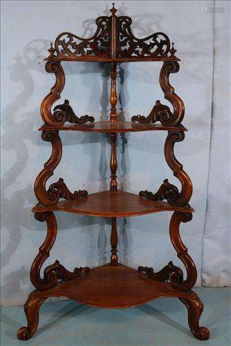 Walnut Victorian etagere with pierced carved crown