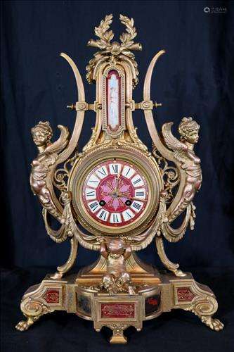 Contemporary brass clock with mythological figural