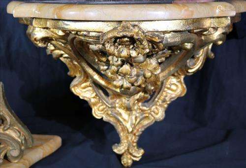 Pair of French gold gilded wall shelves with marble